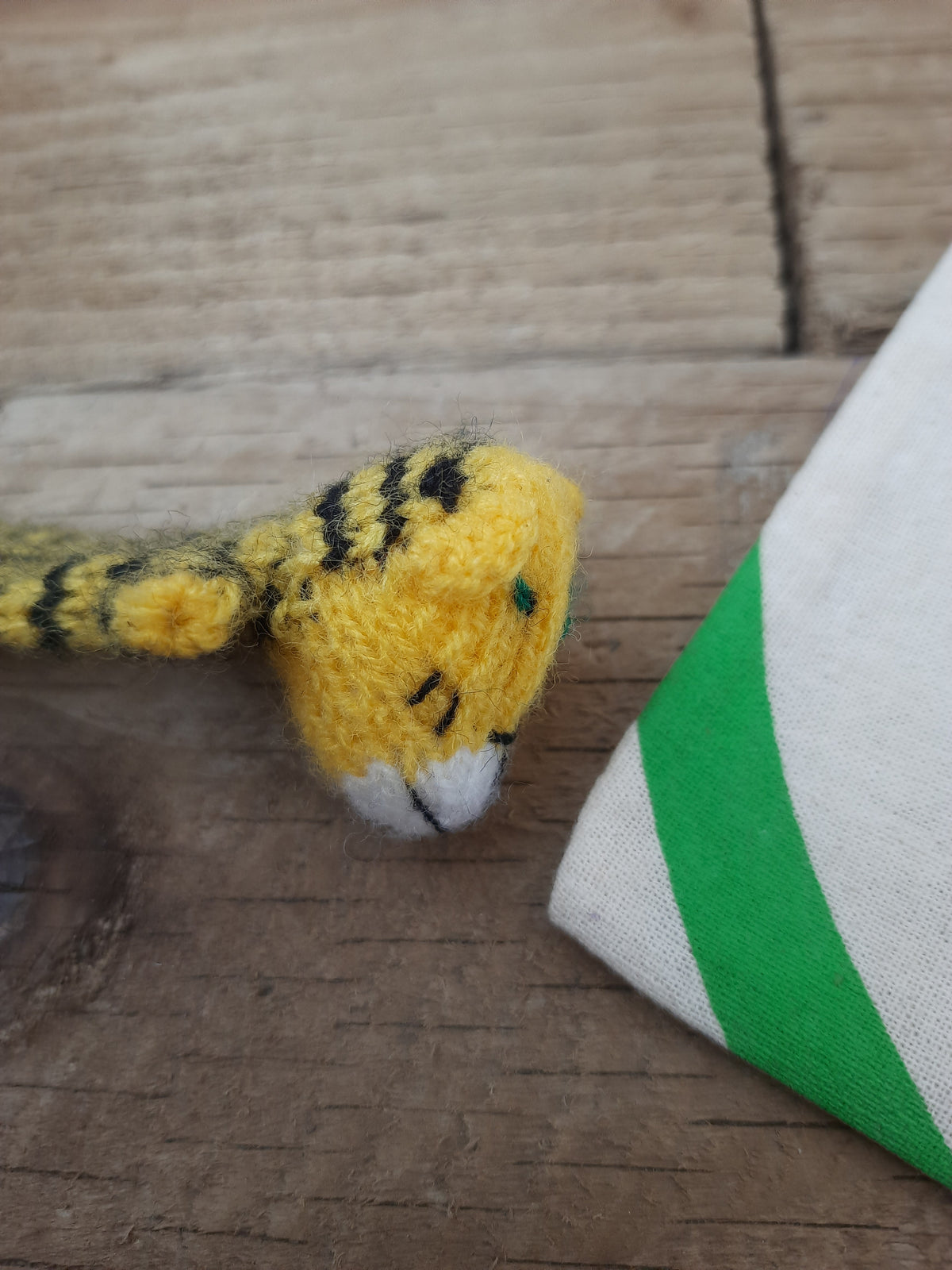 Colourful tiger finger puppet close-up