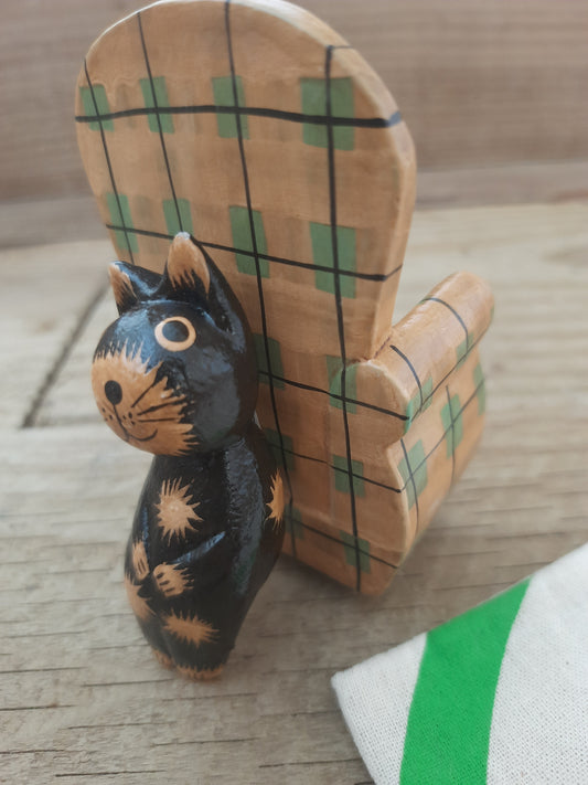 Wood Cat Lounging on Sofa