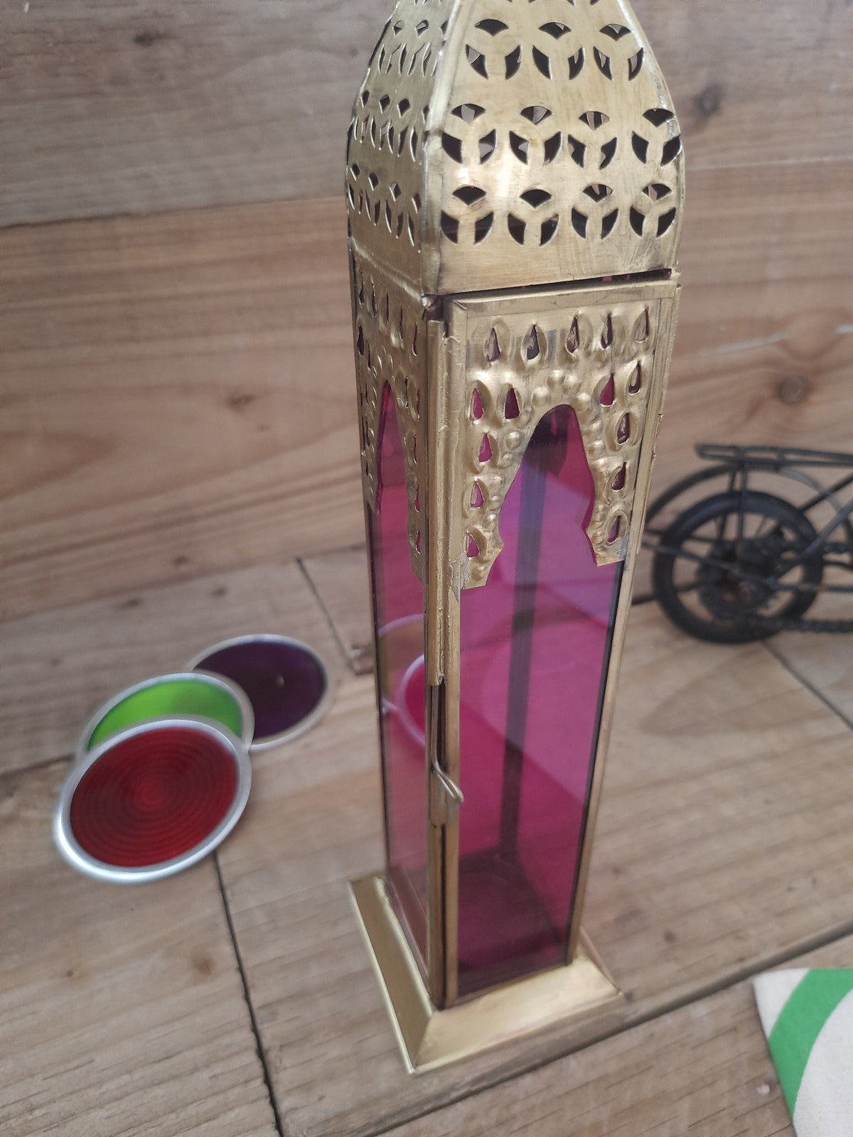 Pink Moroccan lantern with decorative metal detailing