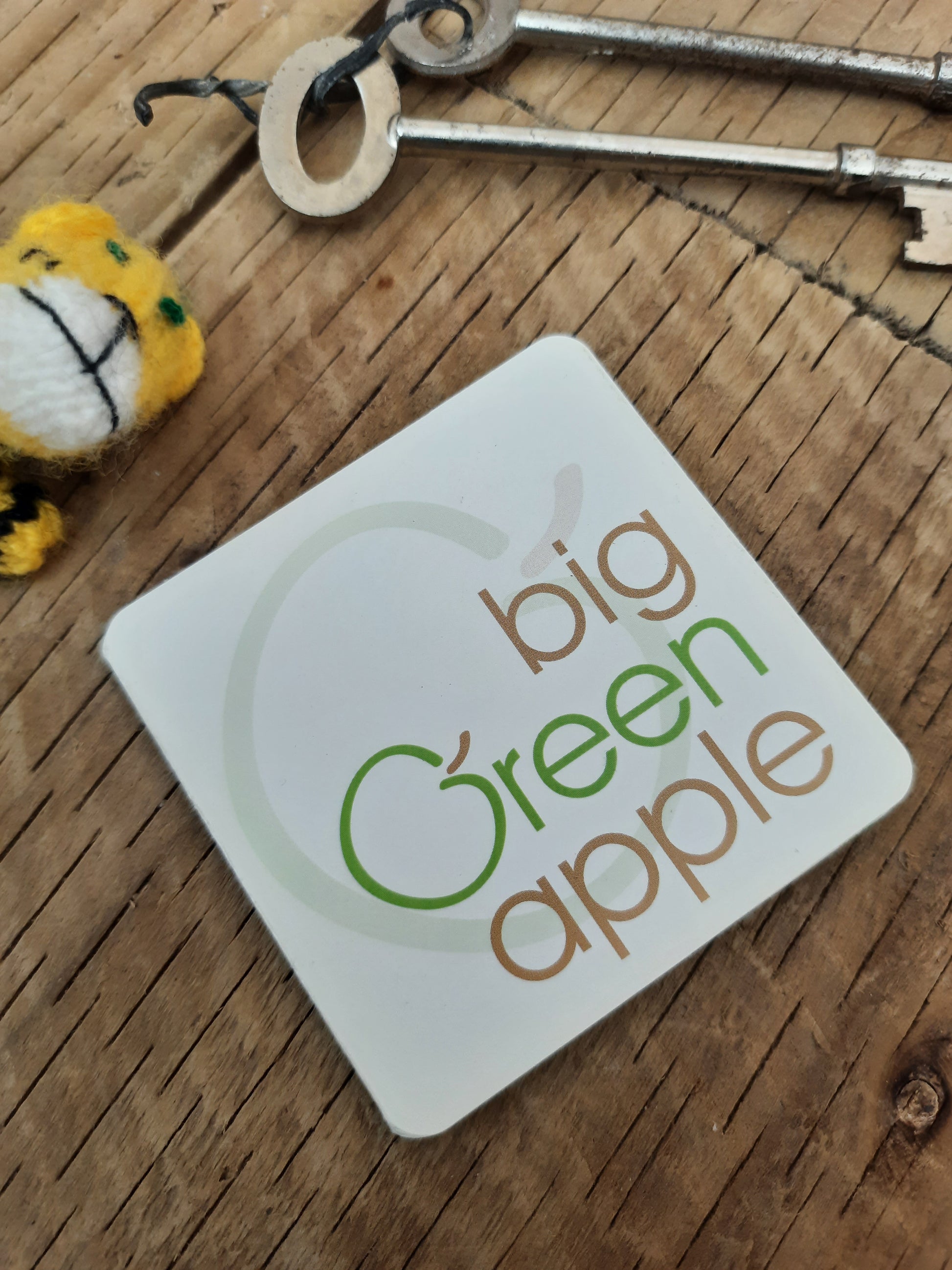 big green apple brand logo