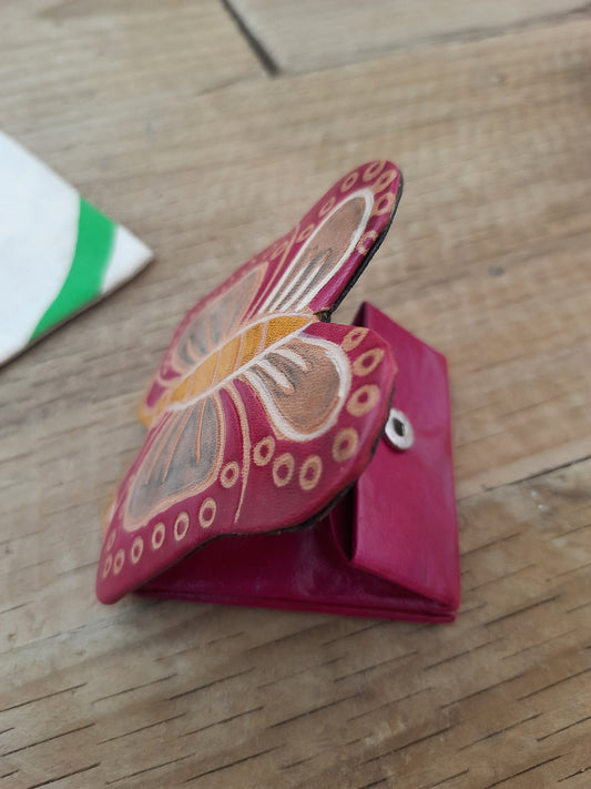 Pink coin purse with butterfly design