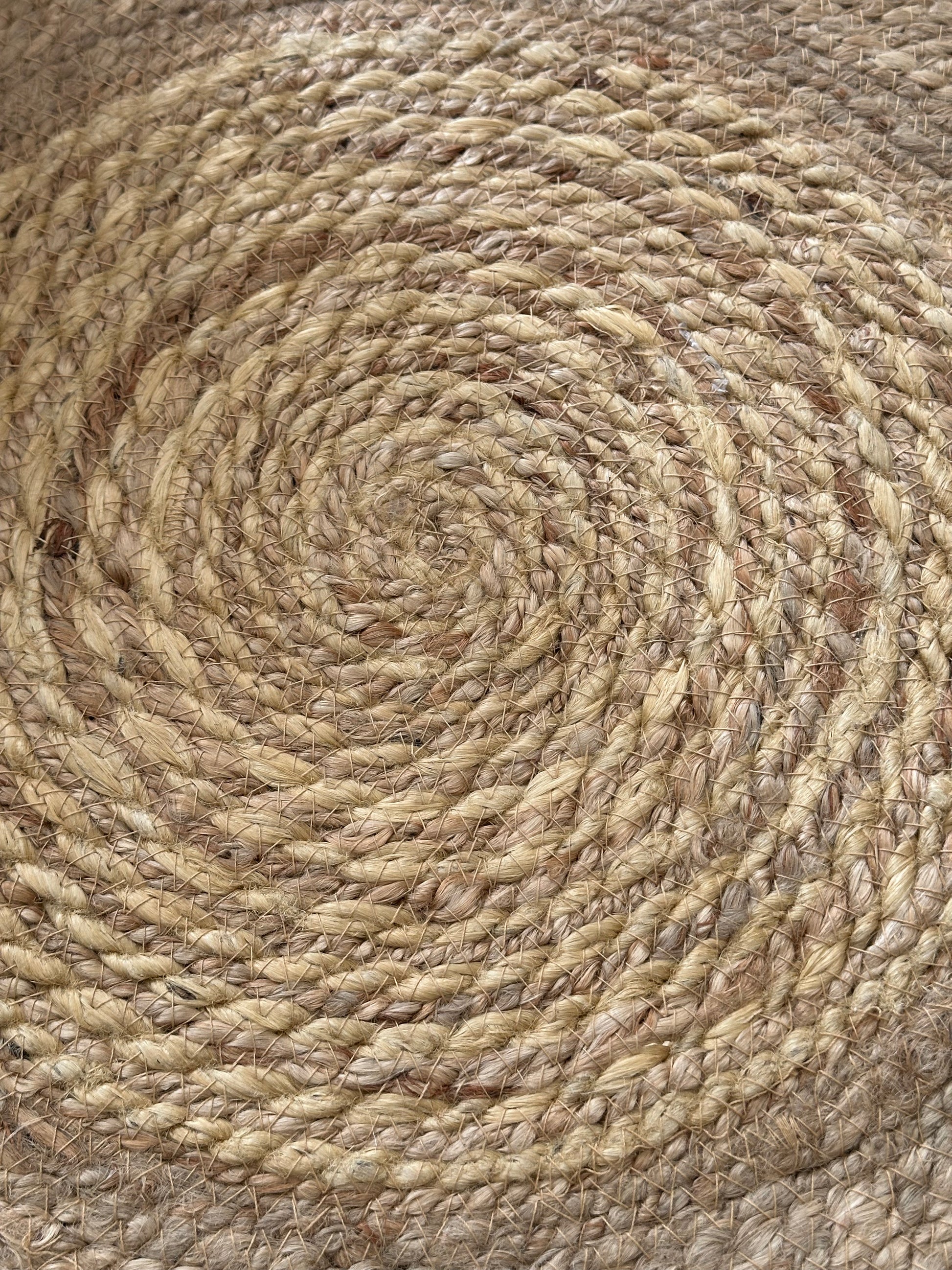 Beige jute rug adding natural texture to home décor
