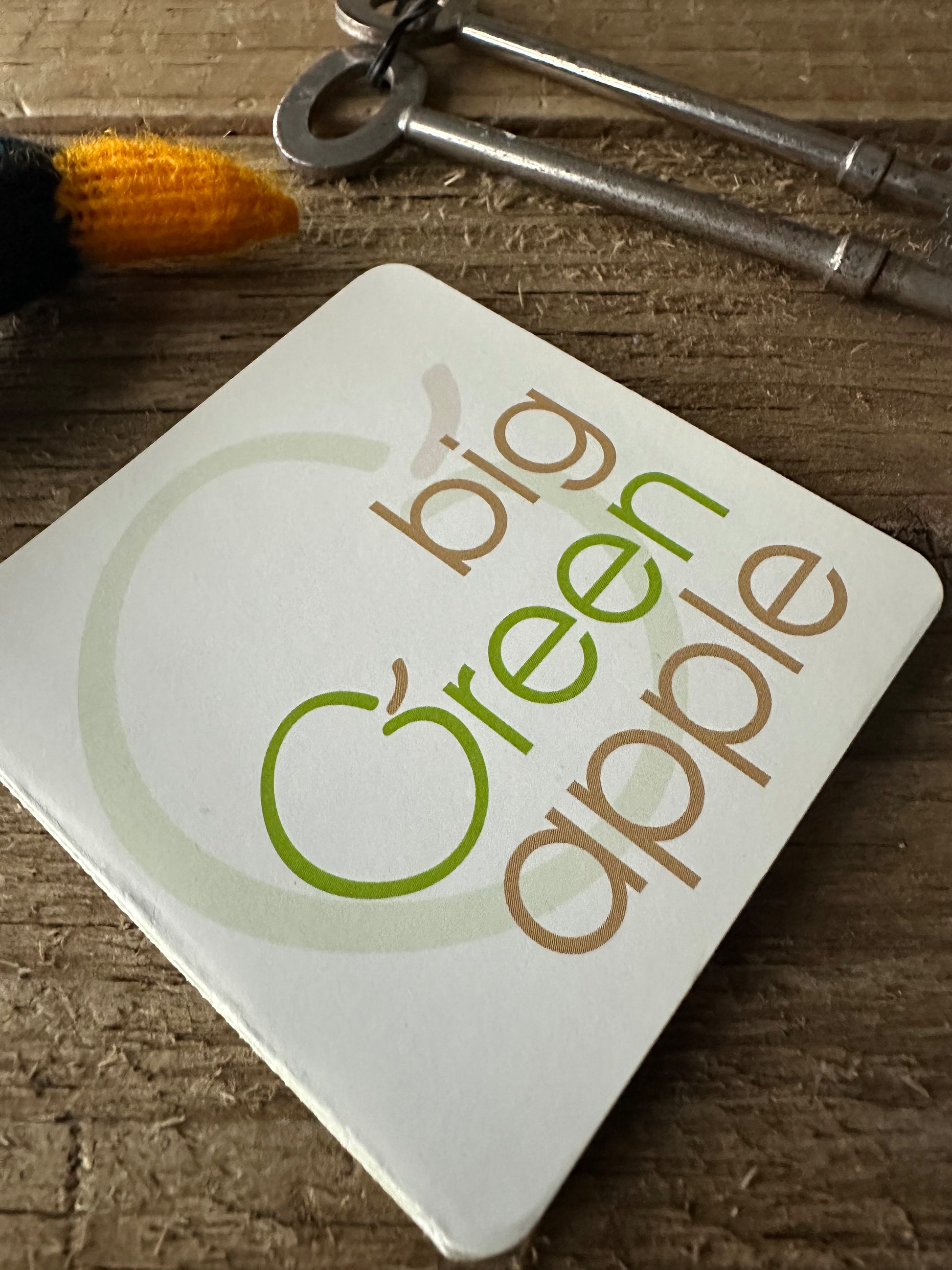 Big green apple brand logo