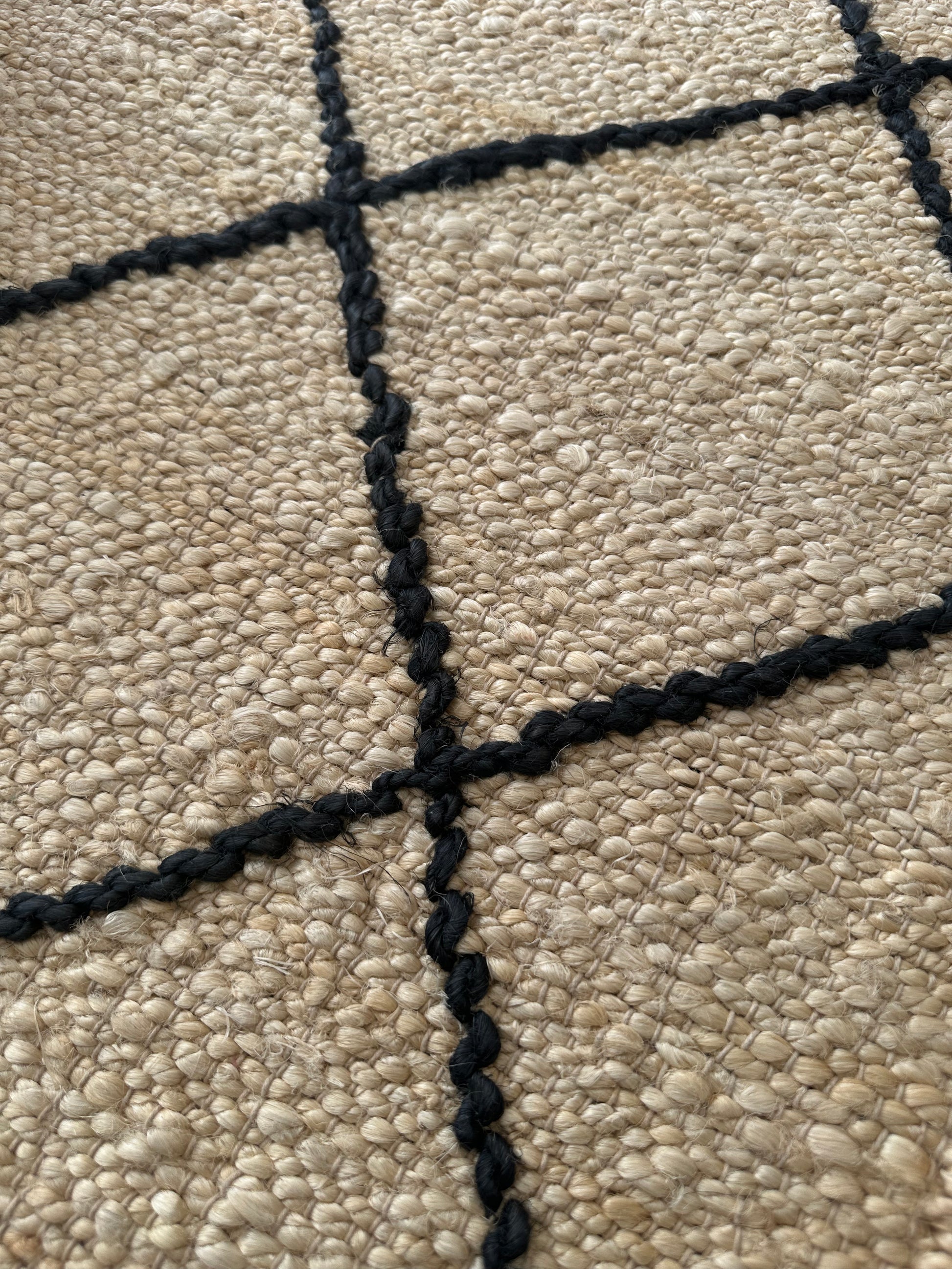 Handmade white jute rug as a home gift with character