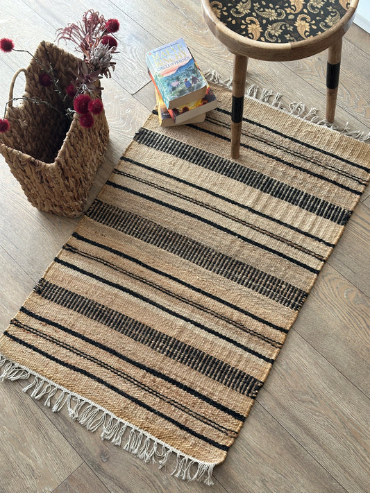 Black and beige cotton rug with geometric design