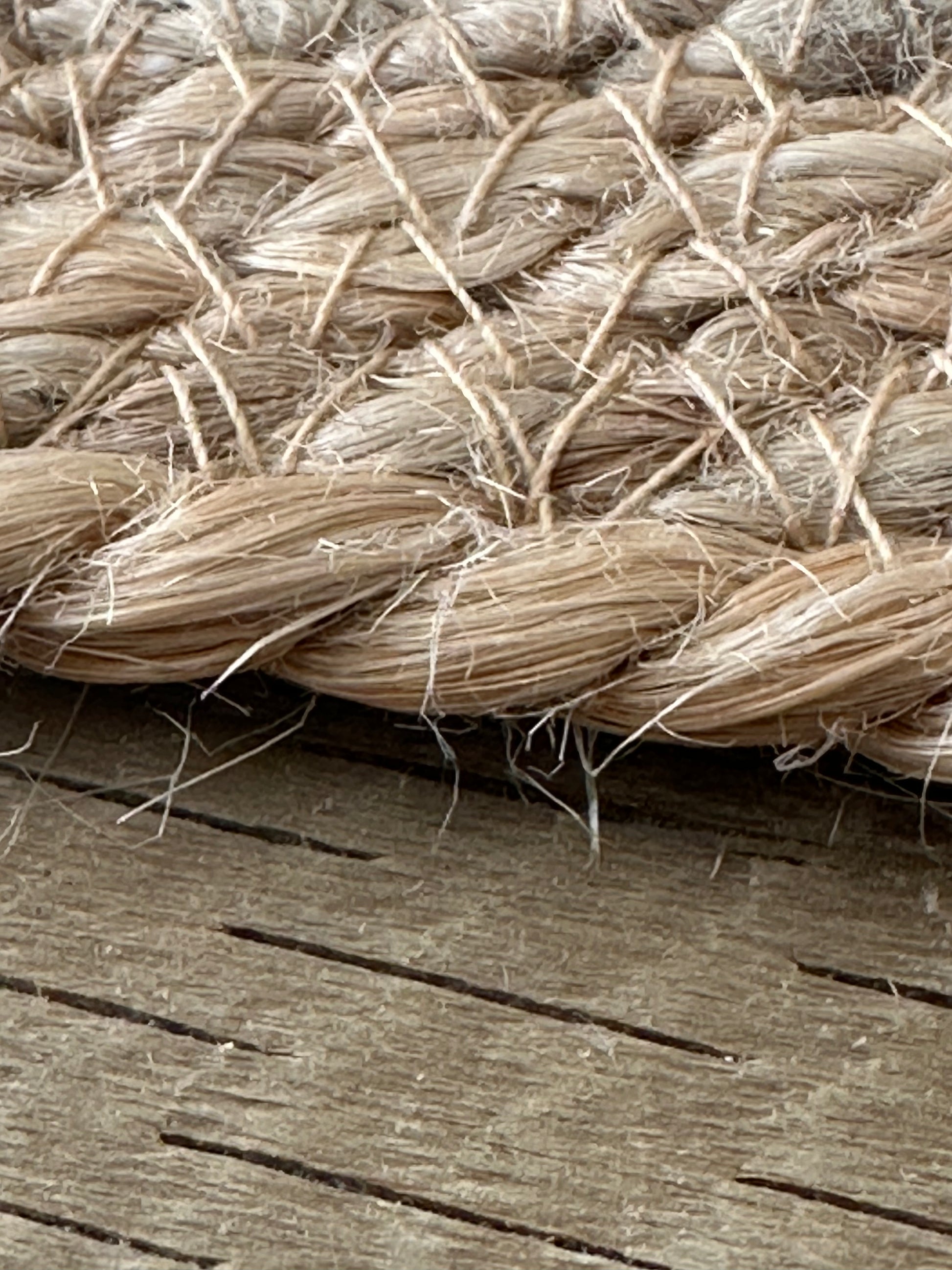 Beige jute floor rug with distinctive blue pattern