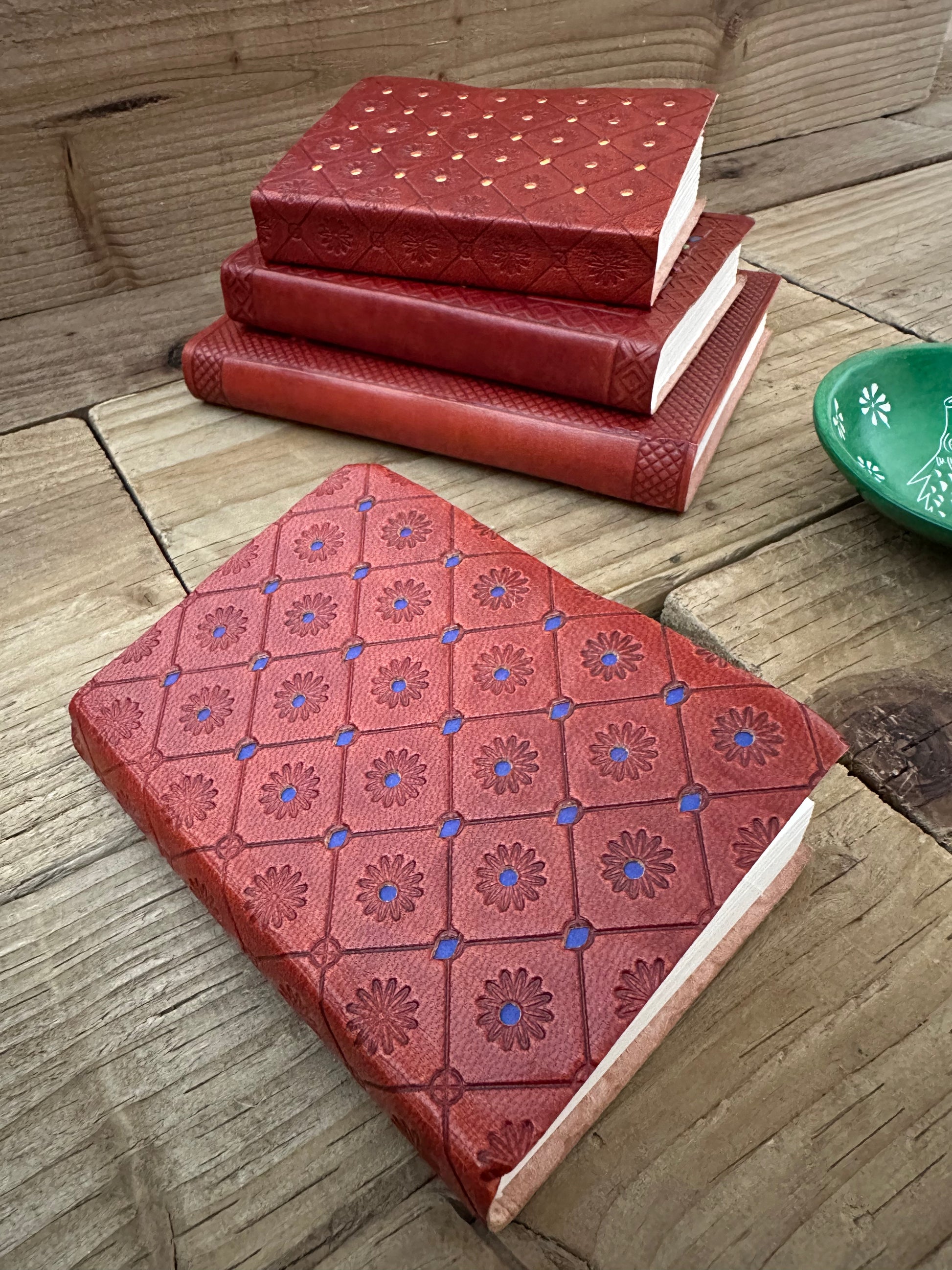 Blue mini leather notebook with embossed detailing