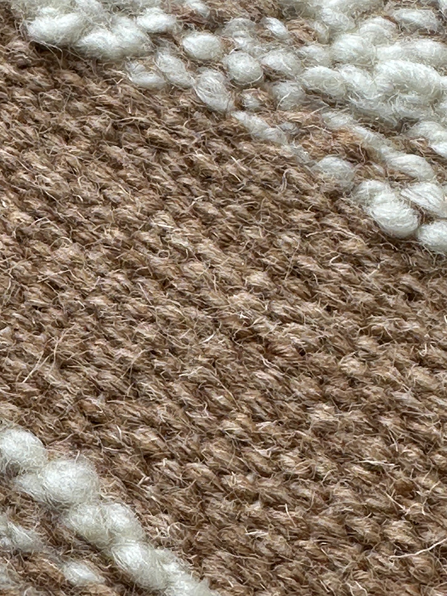 Small brown and white rug for home décor