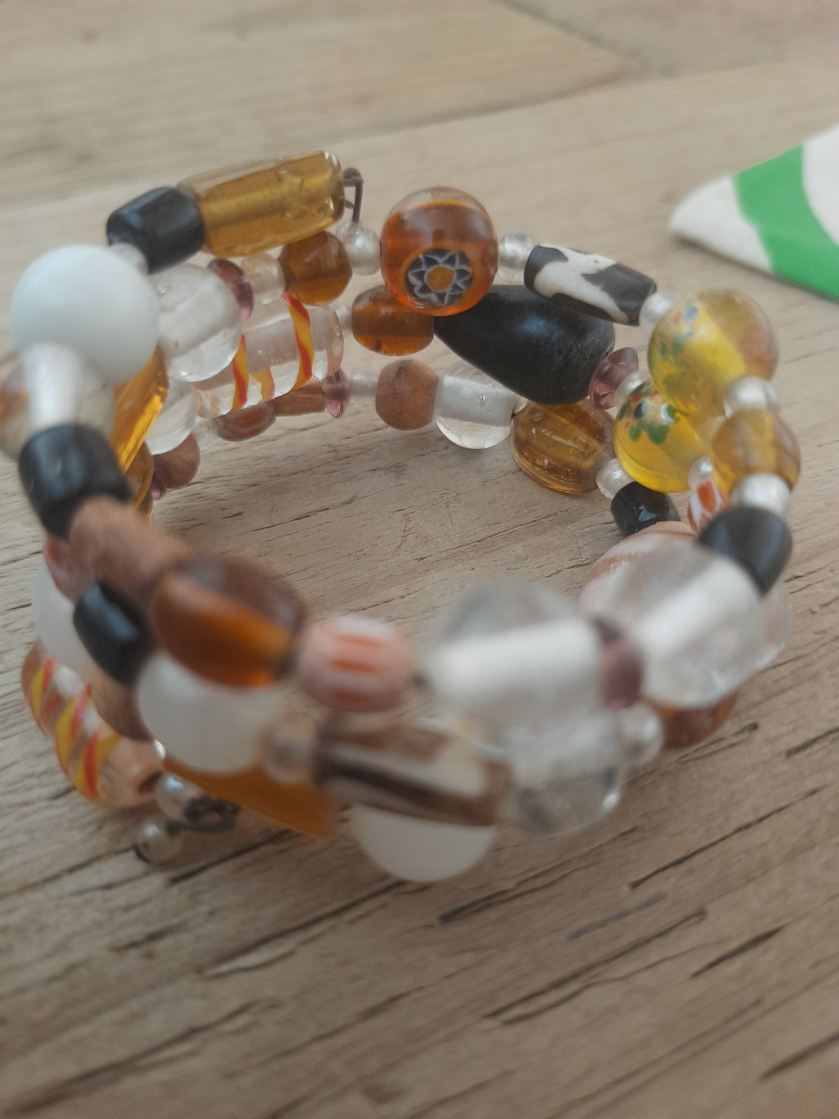 Multicoloured bracelet showing its natural bead textures