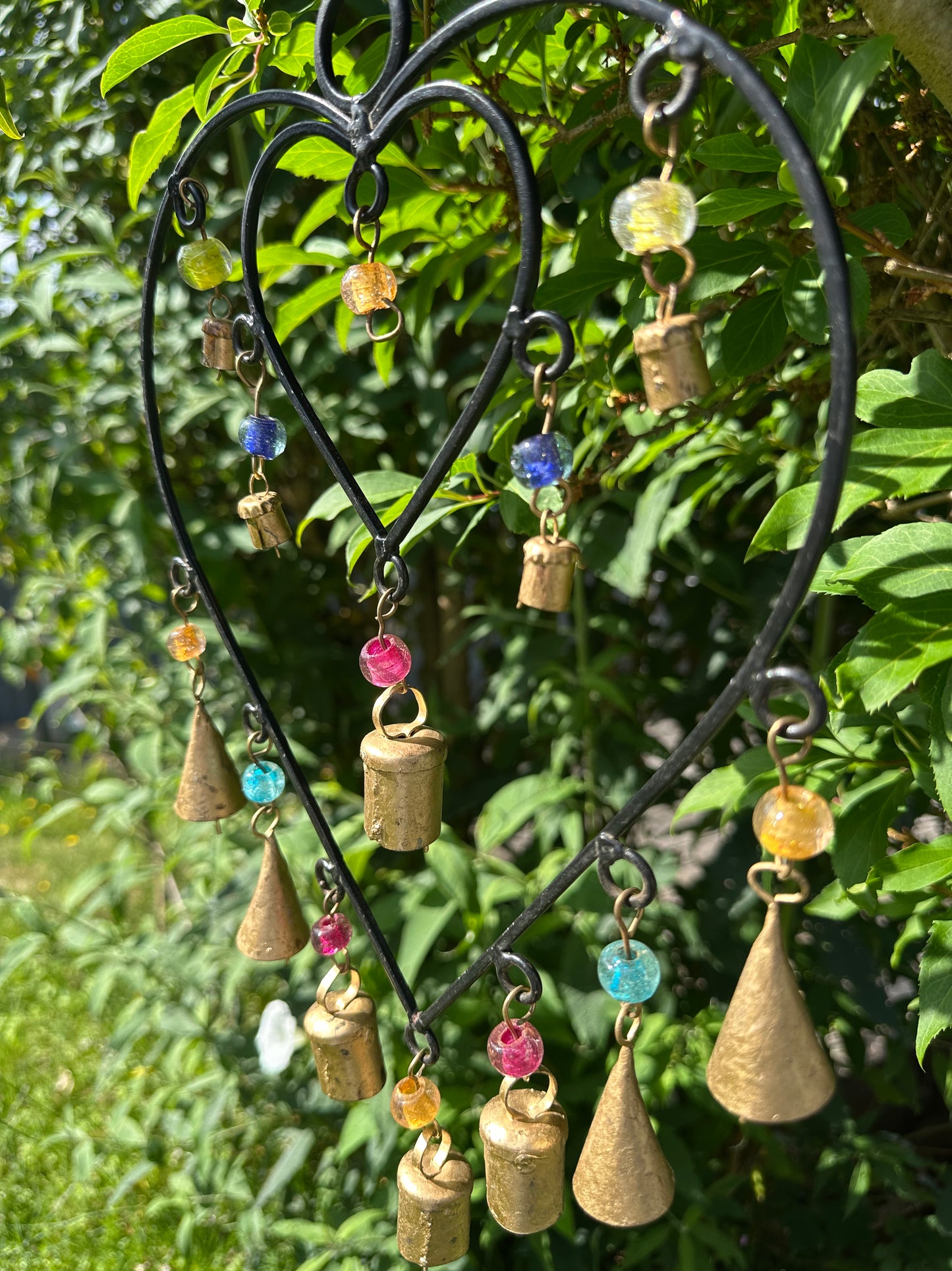 Double heart wind chime with colourful beads and brass bells
