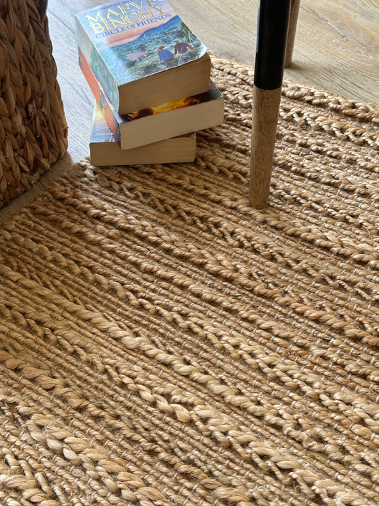 Intertwined brown jute rug with natural texture
