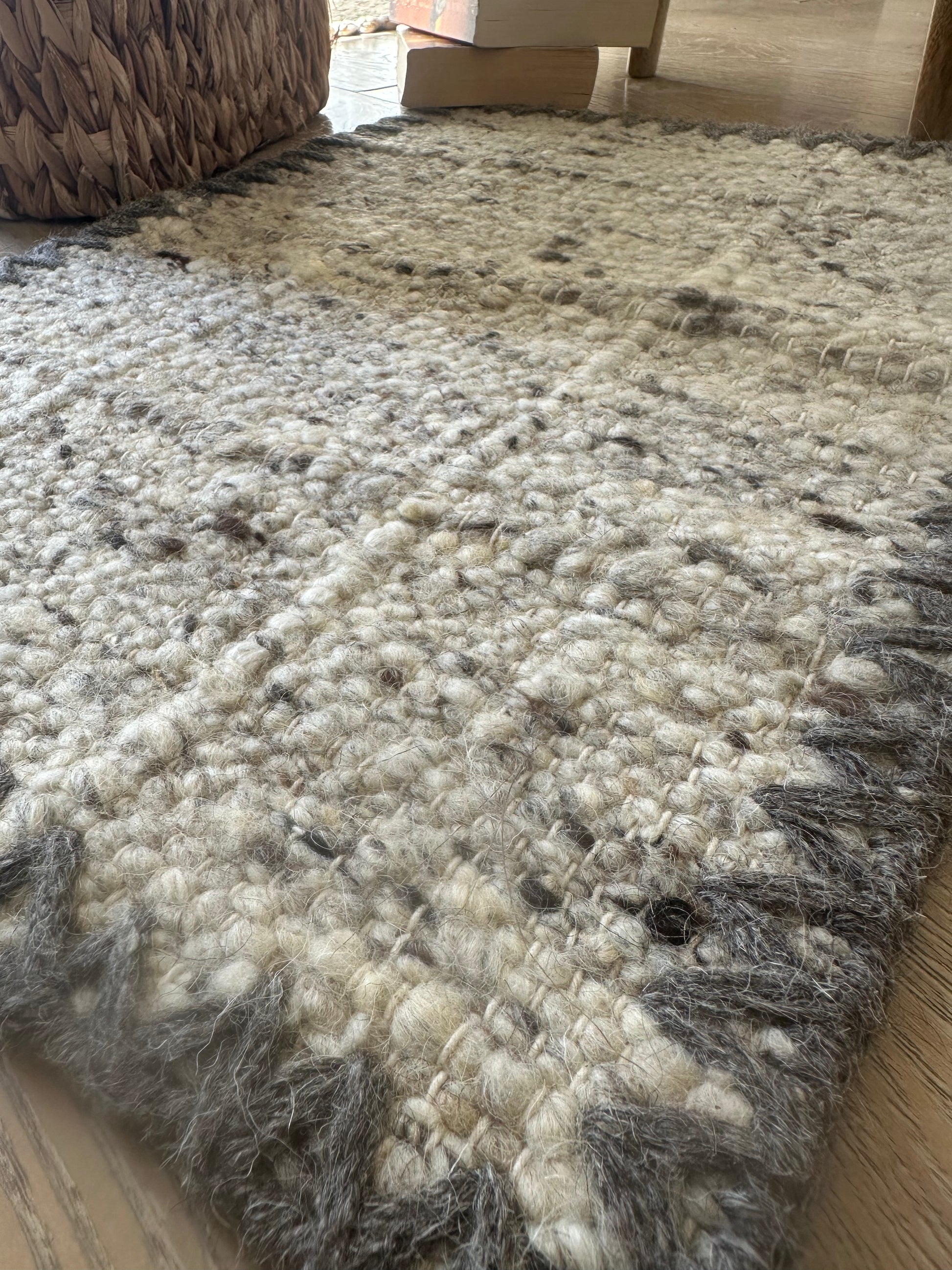 Grey and white rug adding texture to home décor