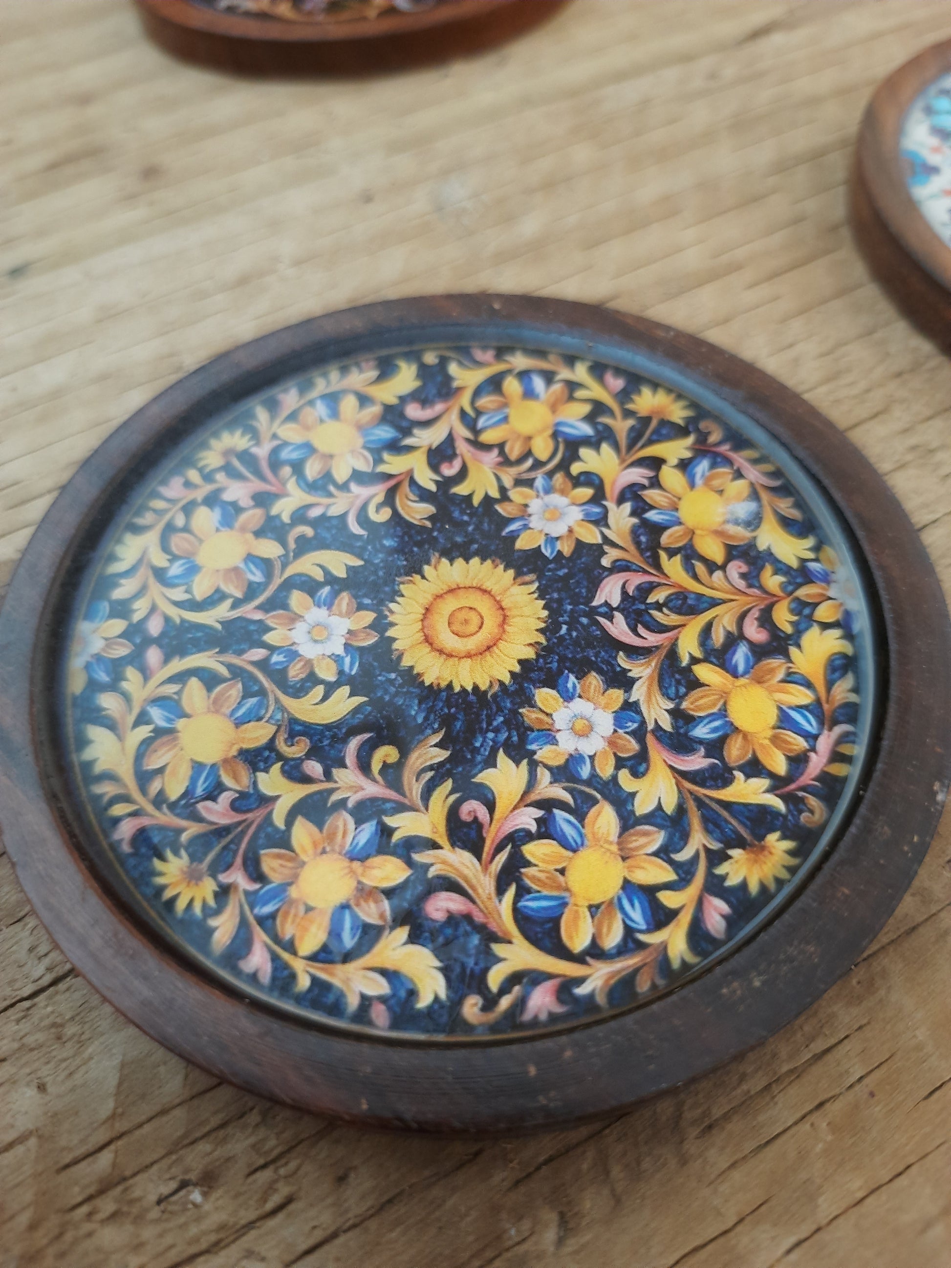 Handcrafted wooden drink coasters arranged on a table