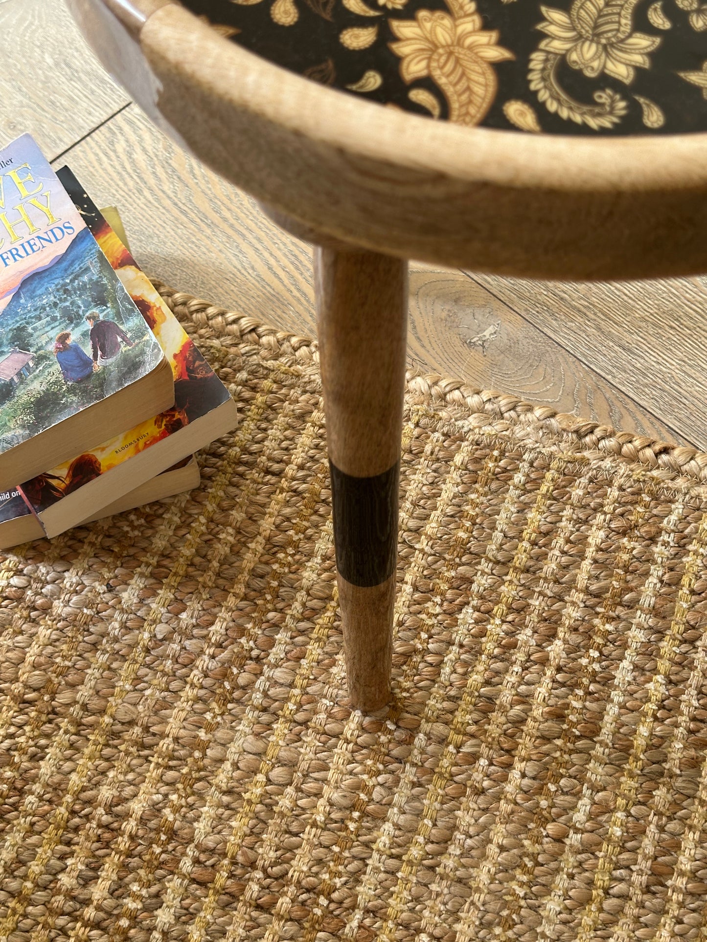 Beige striped jute rug with yellow and brown streaks