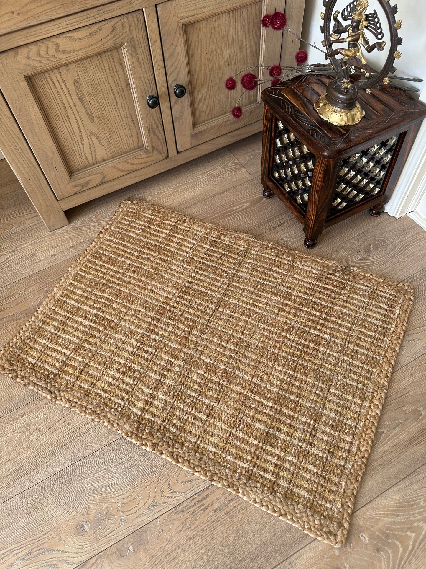 Handmade beige jute rug with woven texture