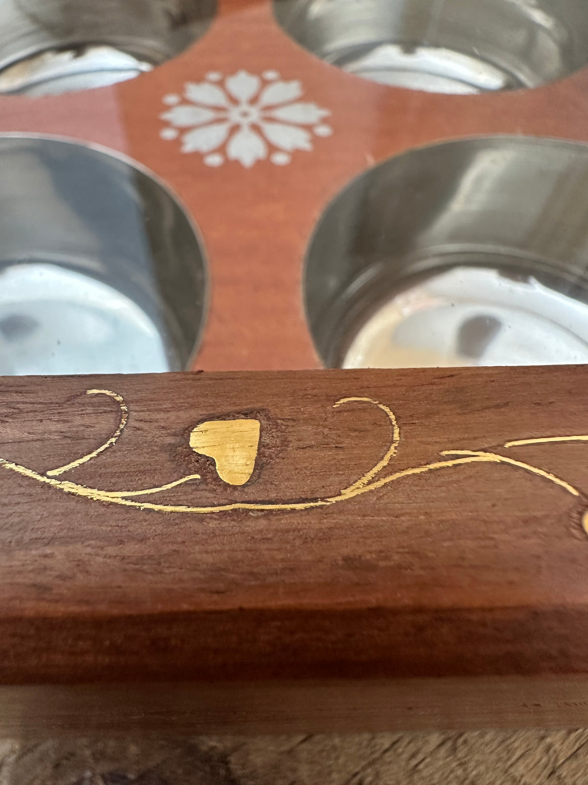 Fleur-de-lis detail inside spice box
