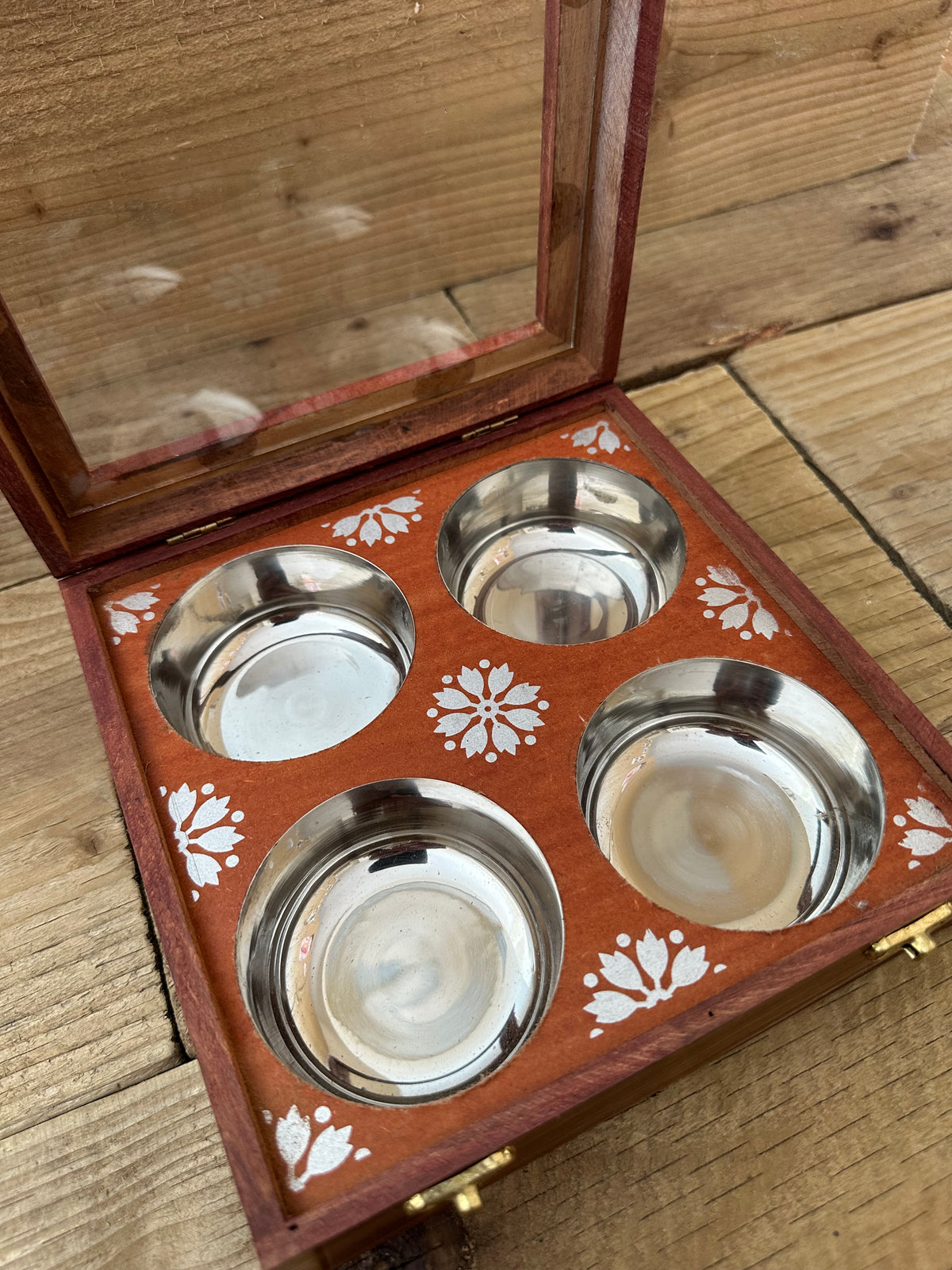 Decorative brass inlay on wooden spice box