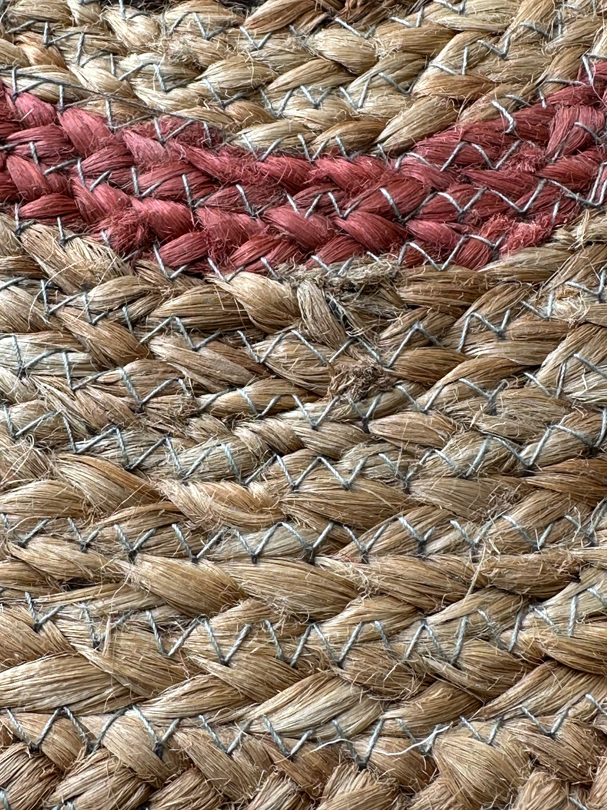 Round jute floor rug for a warm natural interior