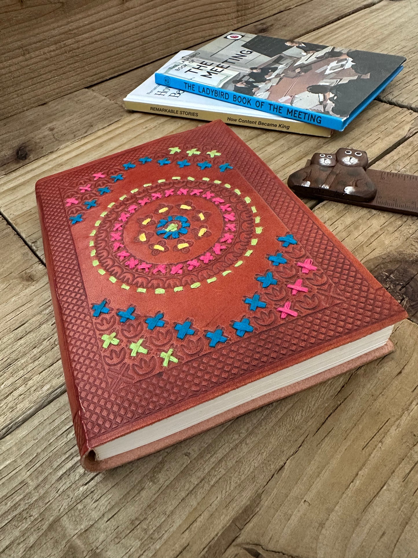 Handcrafted leather-bound notebook front cover