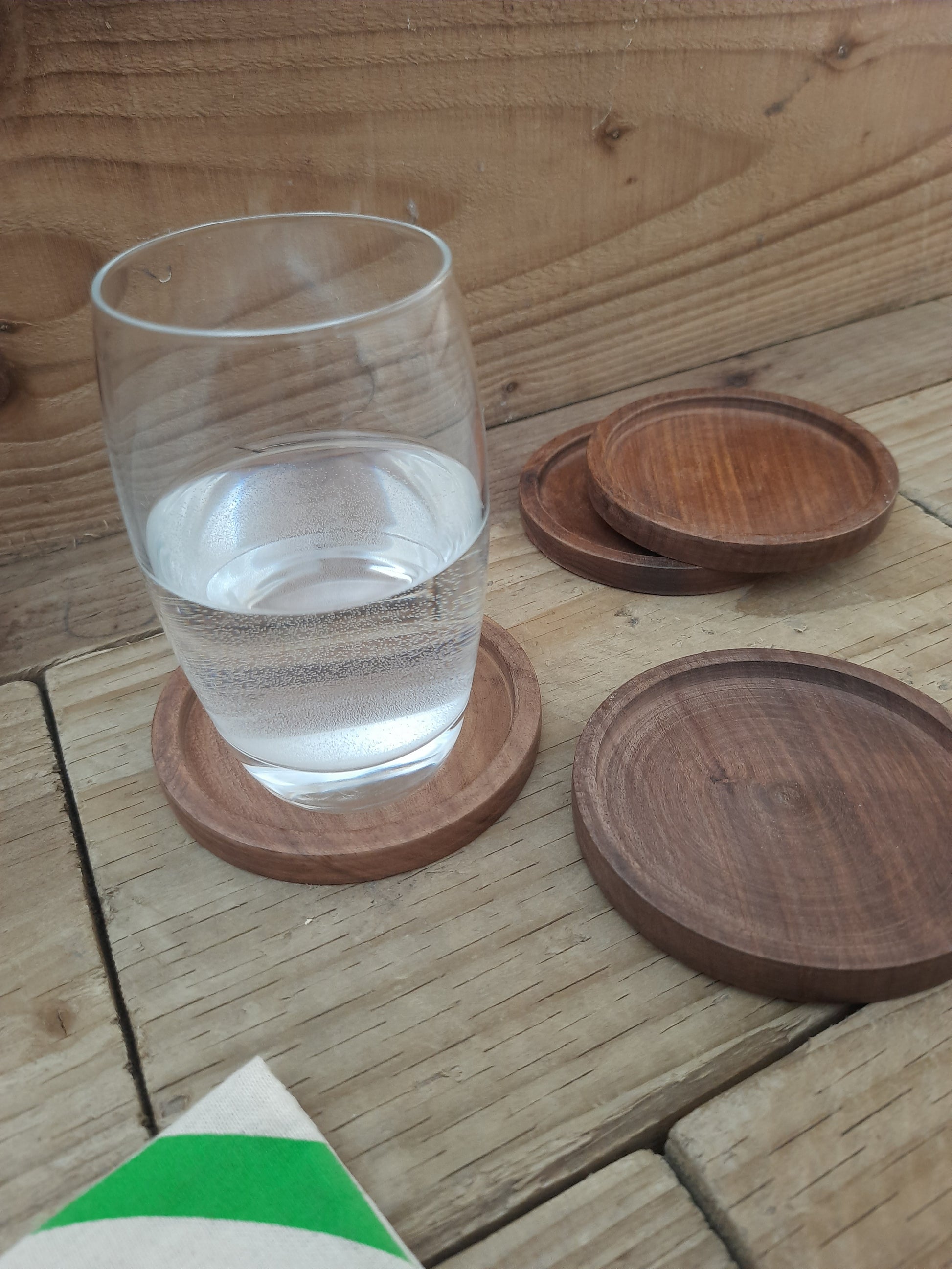 Natural mango wood table coasters with warm varied wood tones