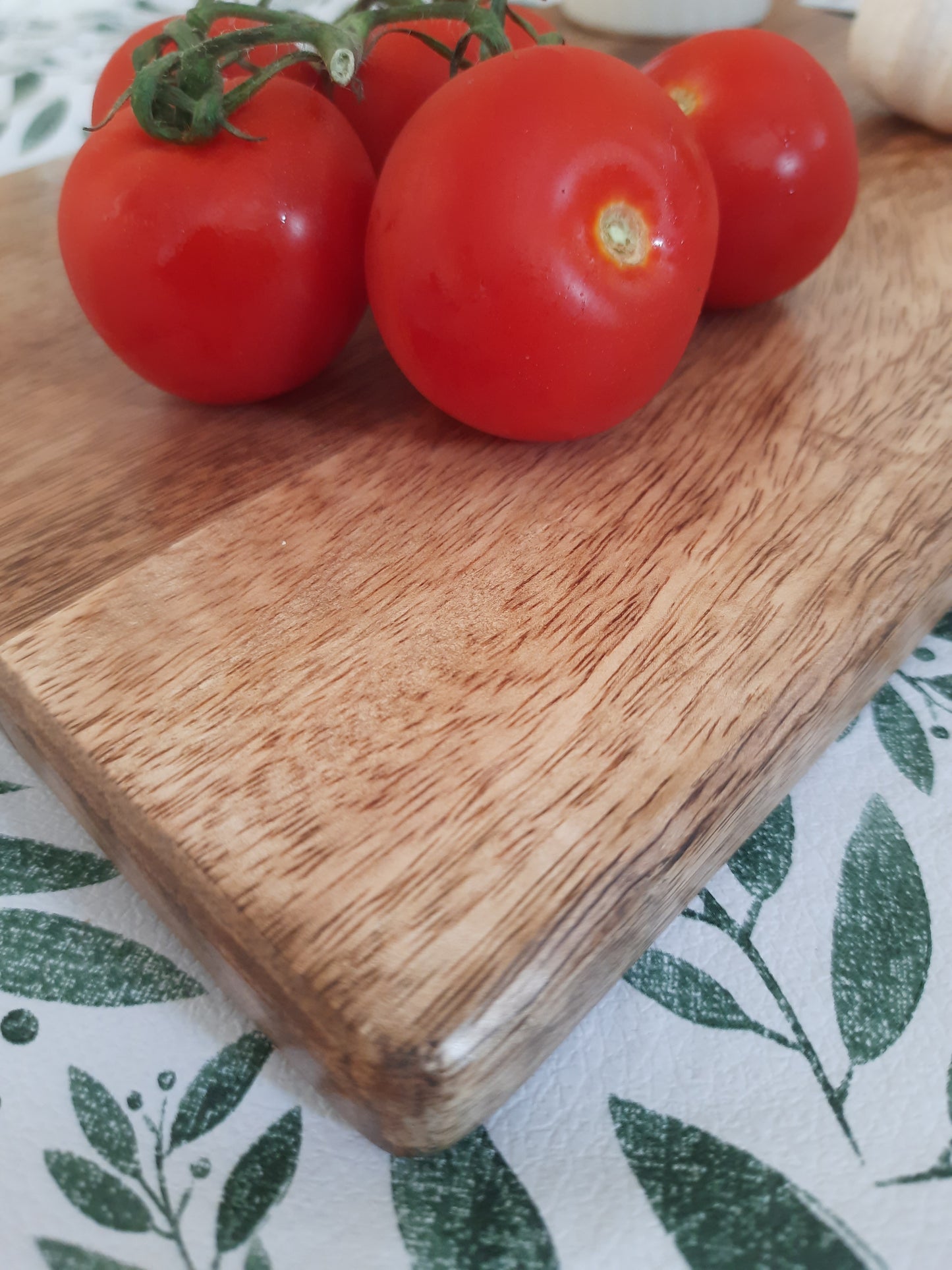 Natural wood chopping board showing wood grain