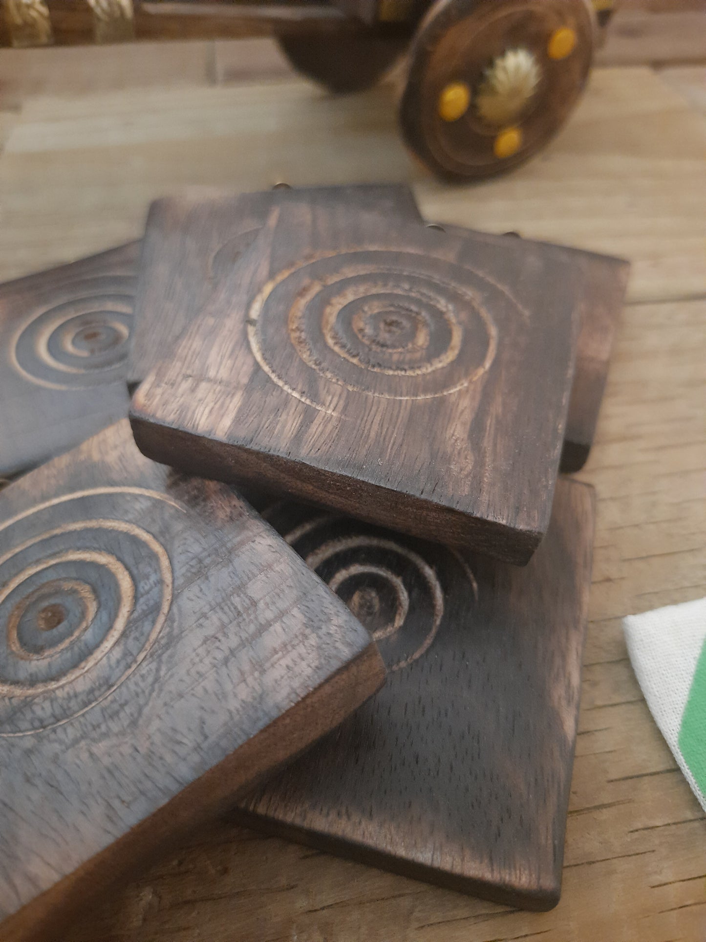 Handcrafted wooden coaster set made by artisans in India