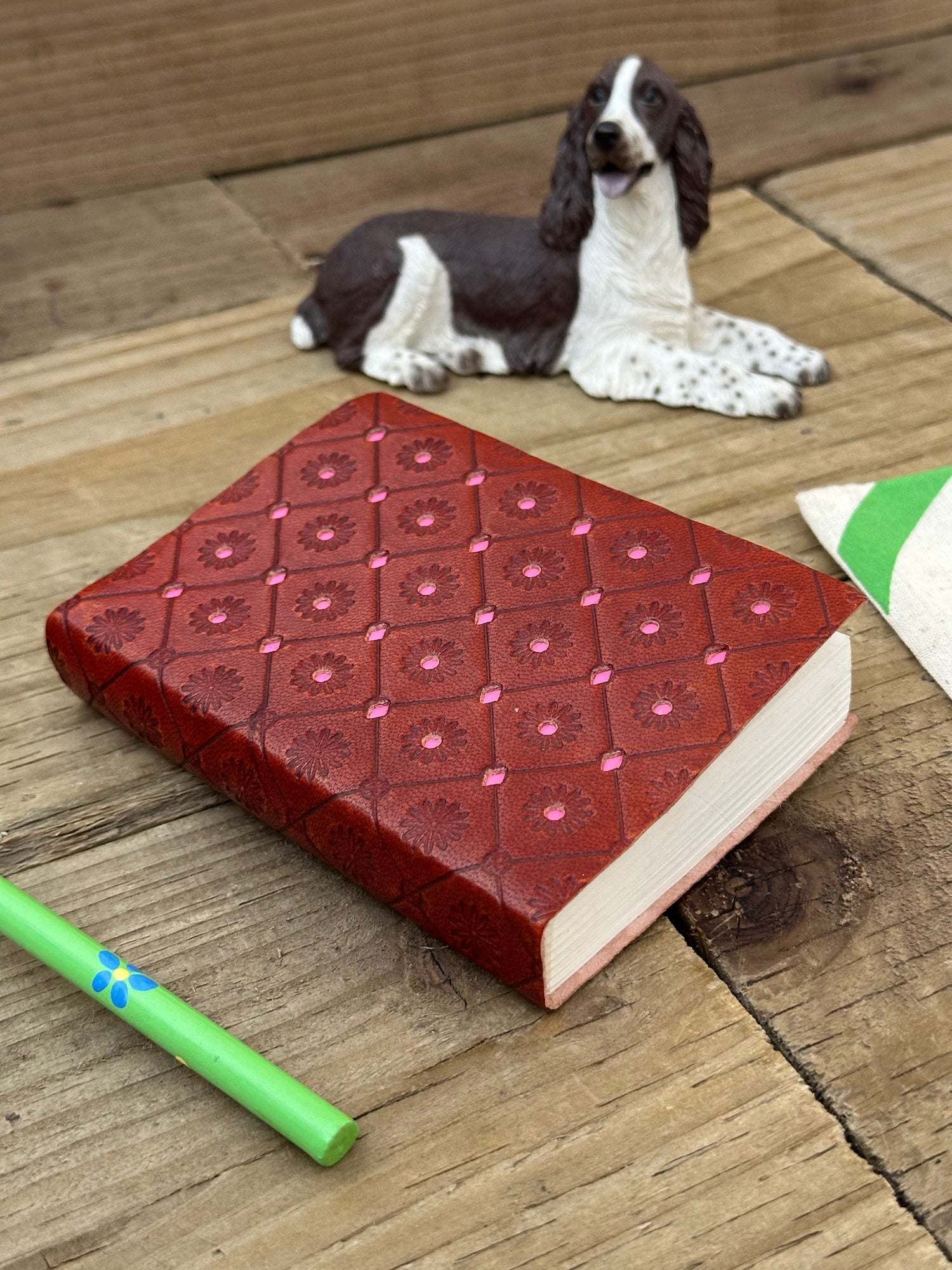 Pink mini leather notebook with embossed decorative cover