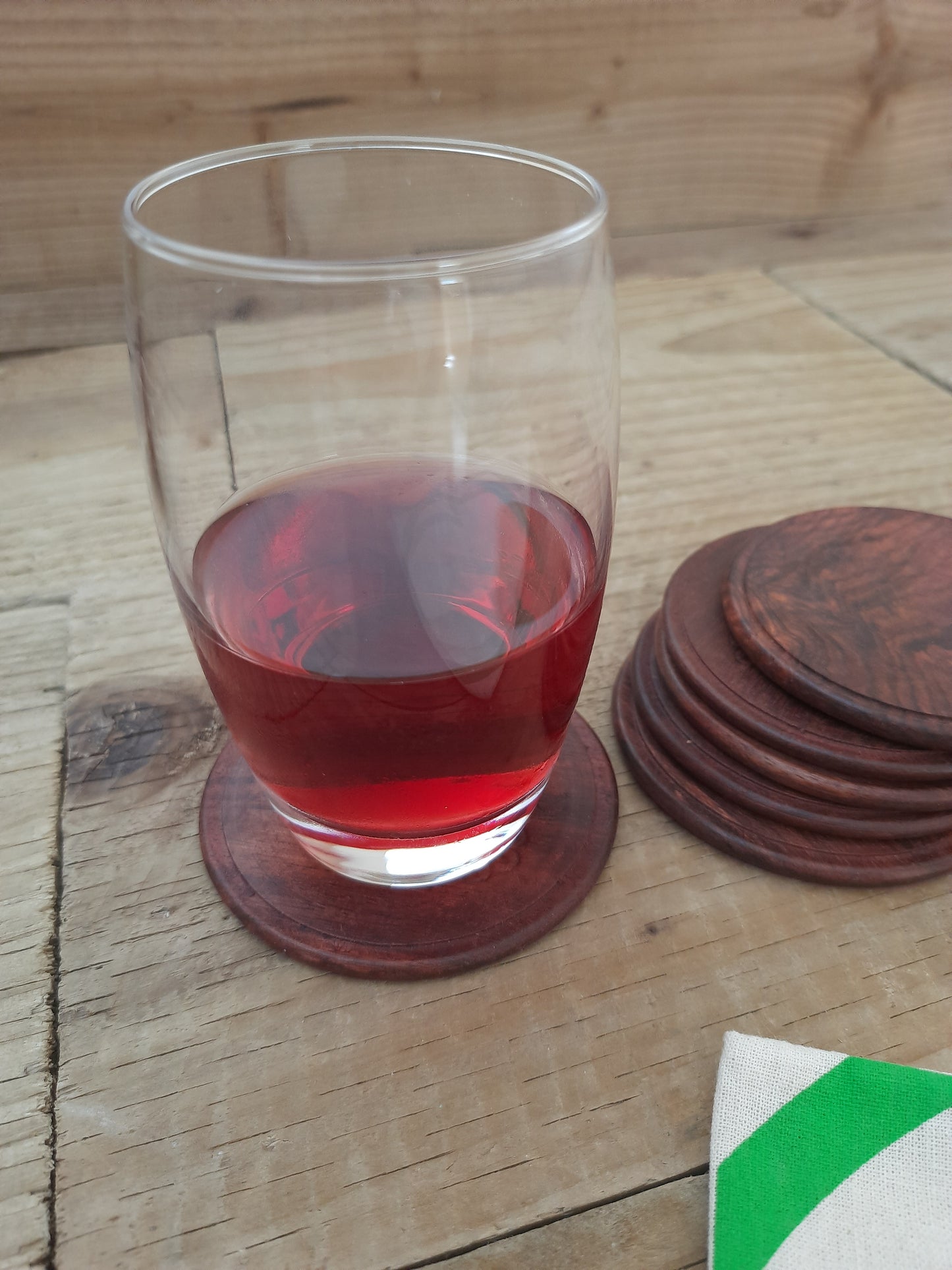 Handcrafted rosewood coasters showing natural wood grain