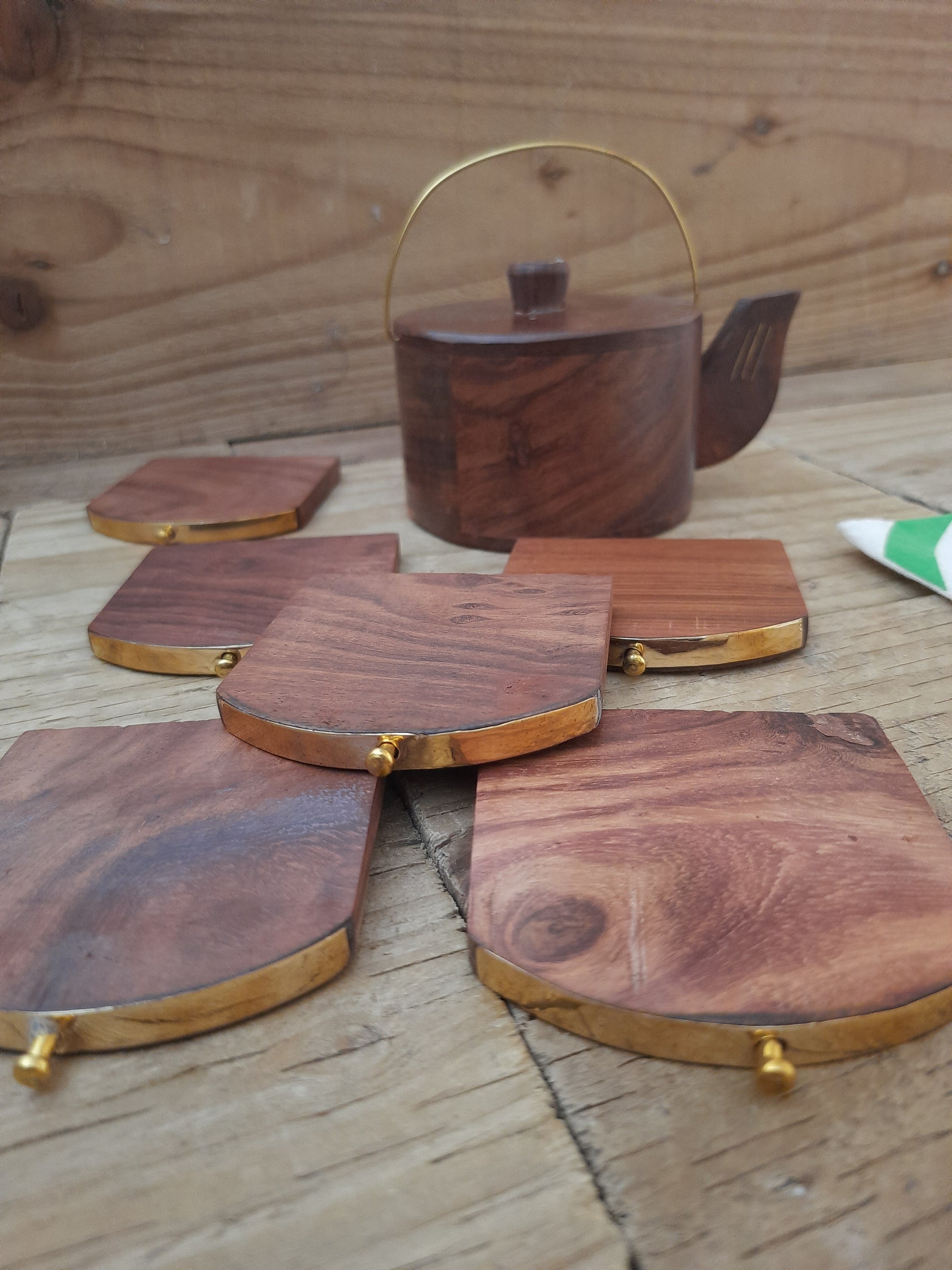 Rosewood tea coasters with brass inlay detailing