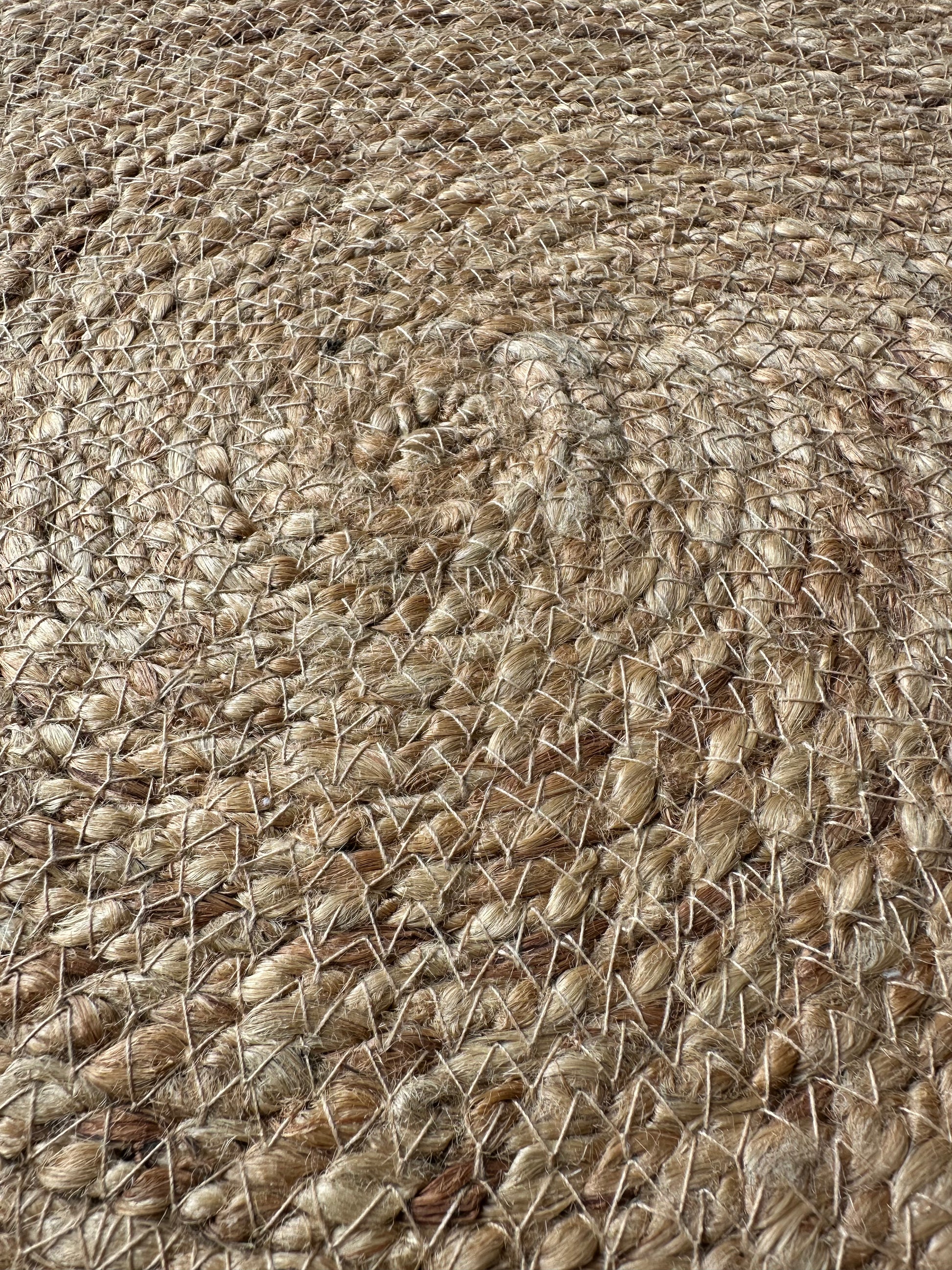 Small round beige jute rug for the home