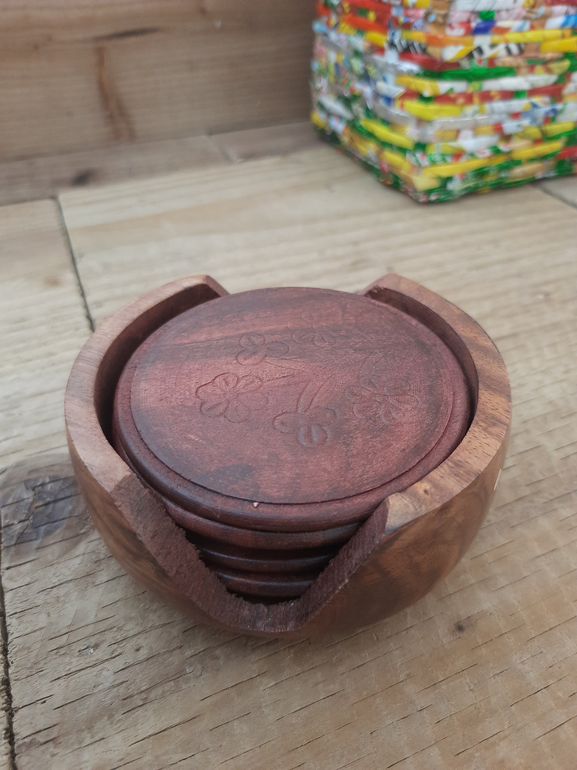Set of six rosewood drink coasters with wooden holder