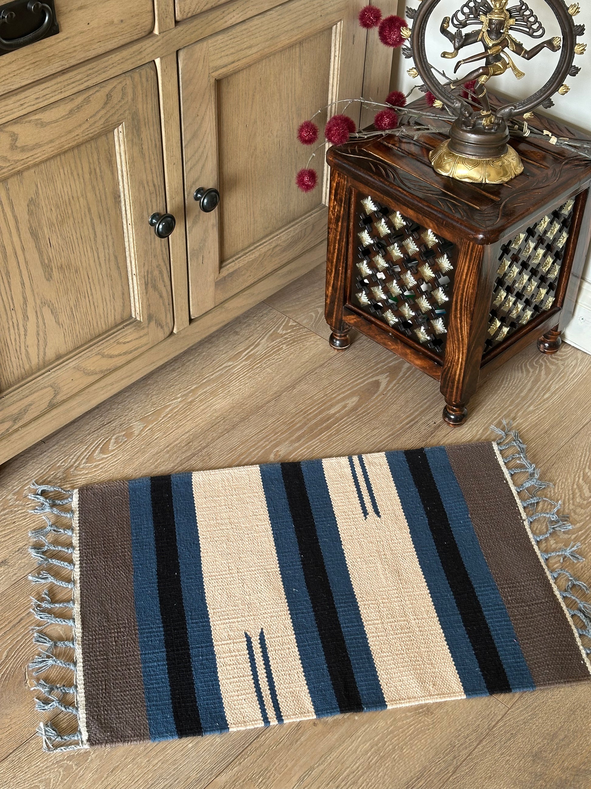 Striped cotton mat as a small home gift
