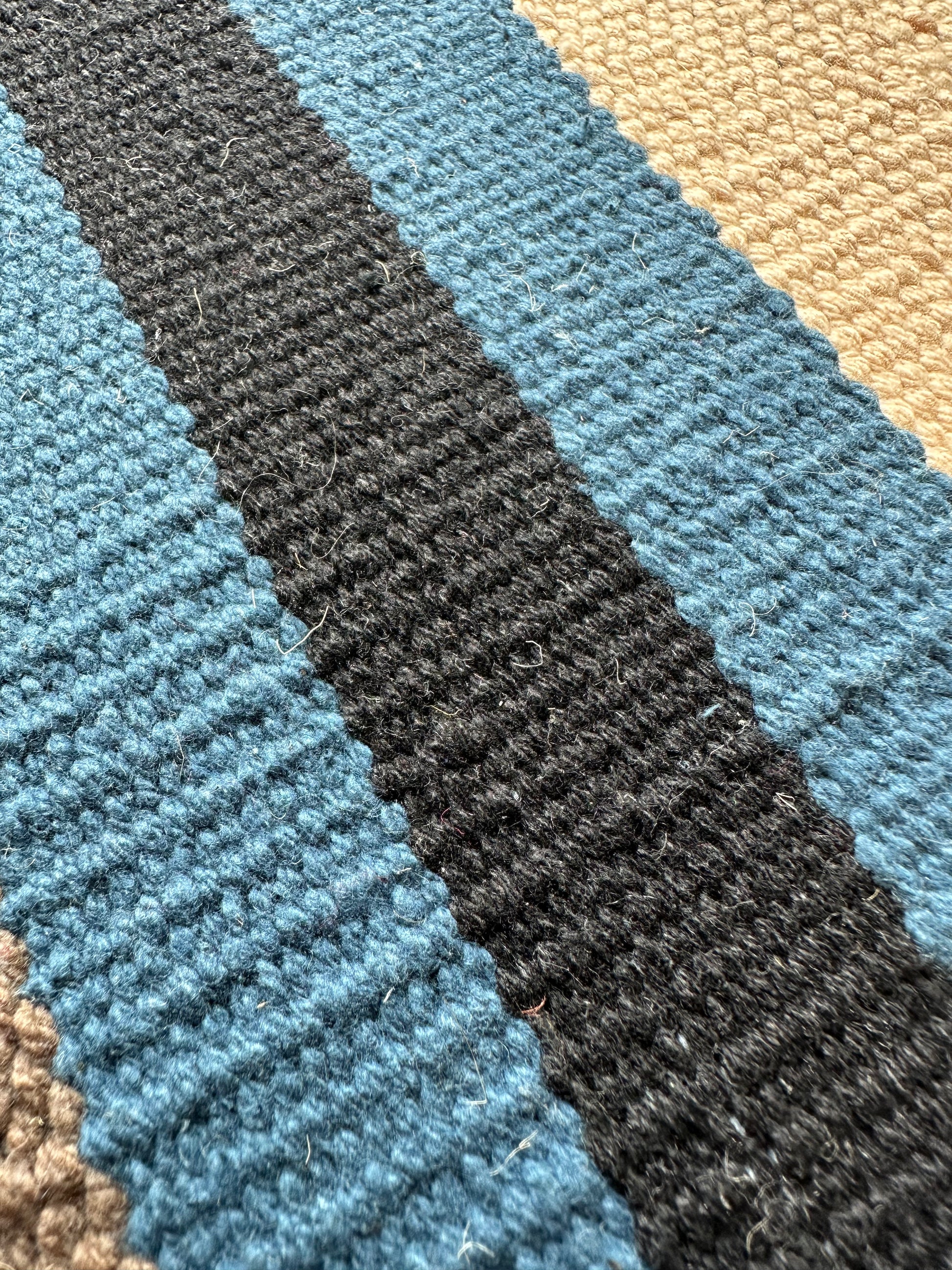 Striped cotton mat with tassel ends