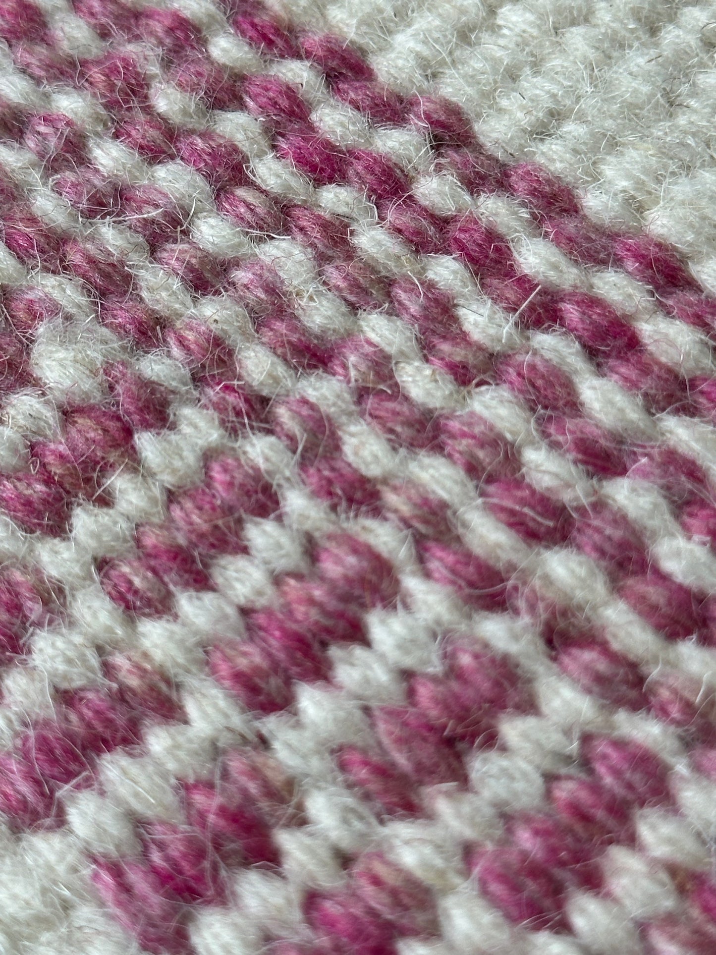 Close-up of red green blue and yellow rug detail