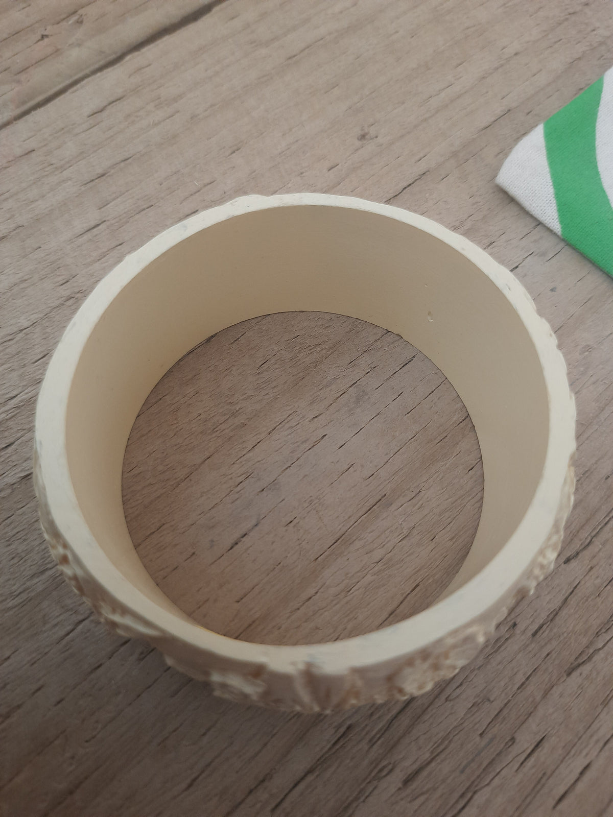 Wide engraved bangle designed as statement jewellery