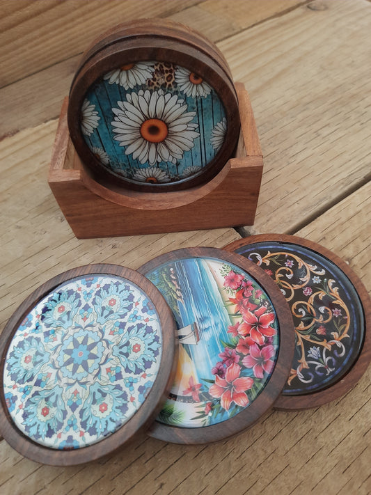 Set of six handcrafted wooden drink coasters with colourful floral and tropical designs