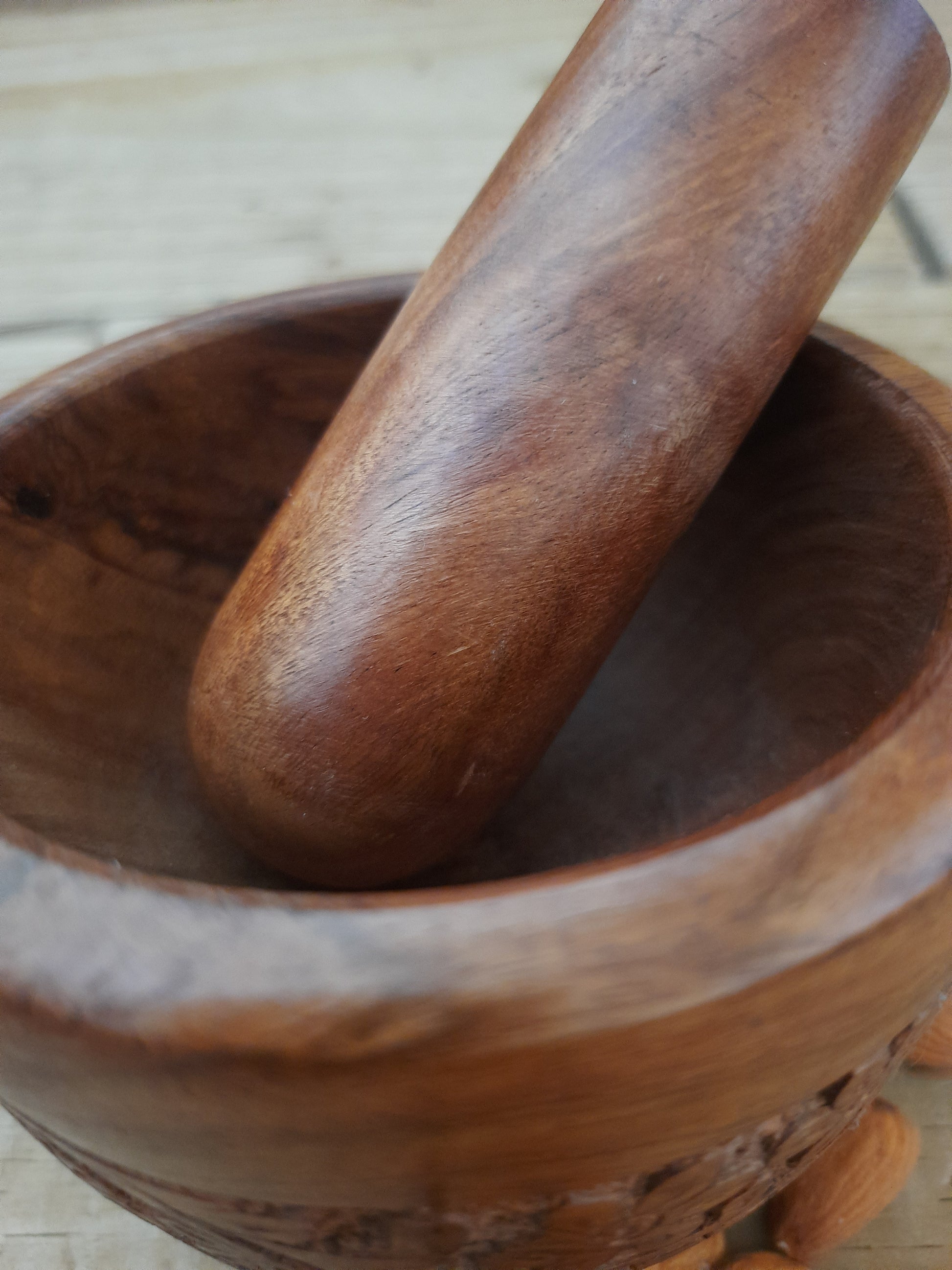 Engraved rosewood mortar and pestle with carved floral design